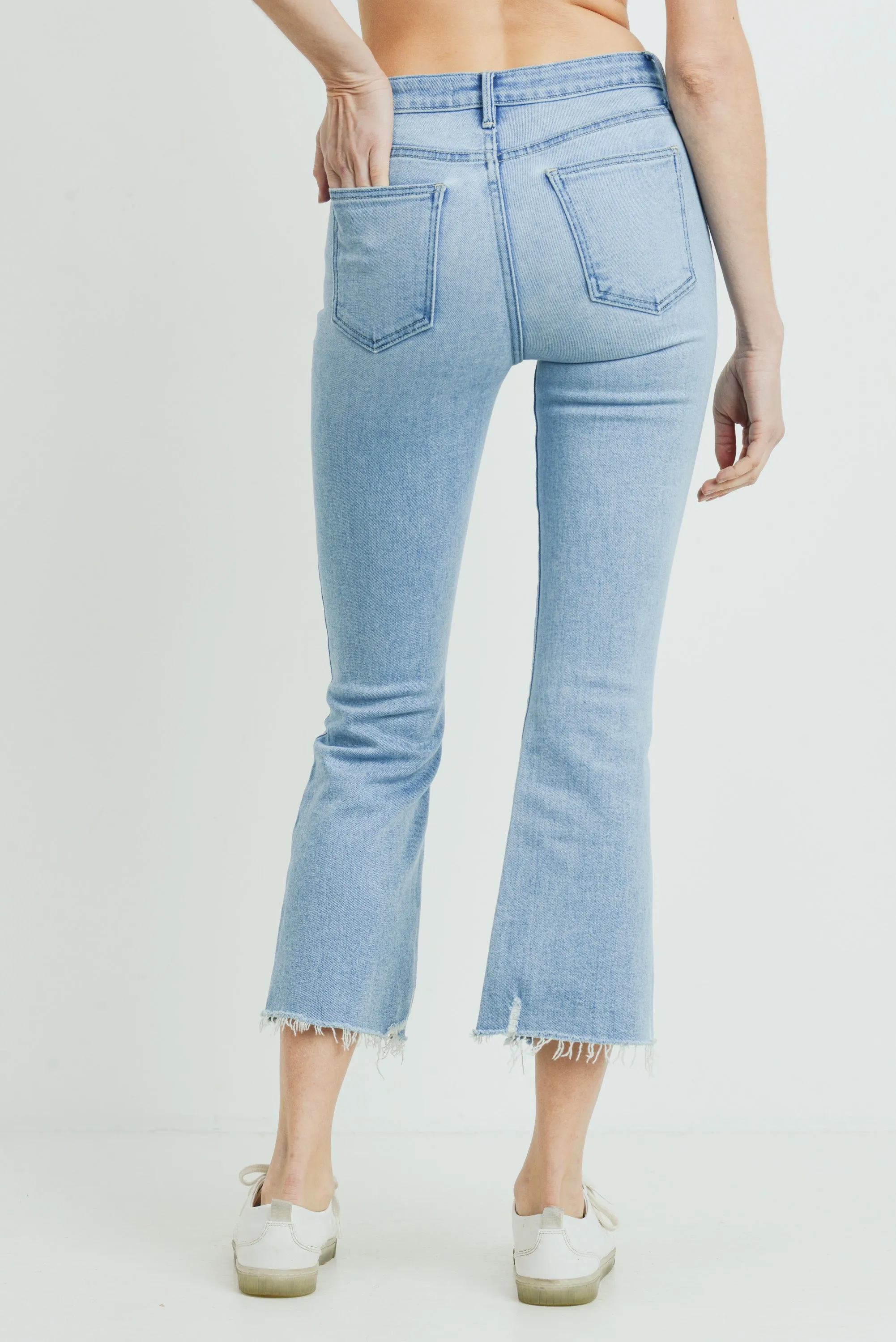 High Rise Crop Flare Distressed Hem in Light Denim