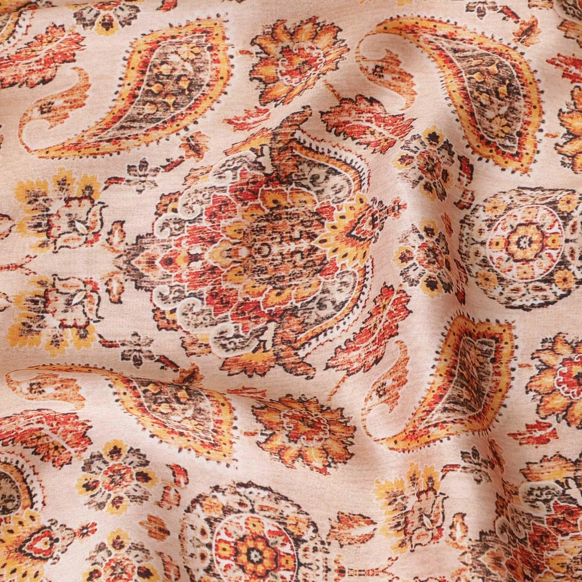 Peach synthetic satin fabric with multicolor print in paisley design-D14175