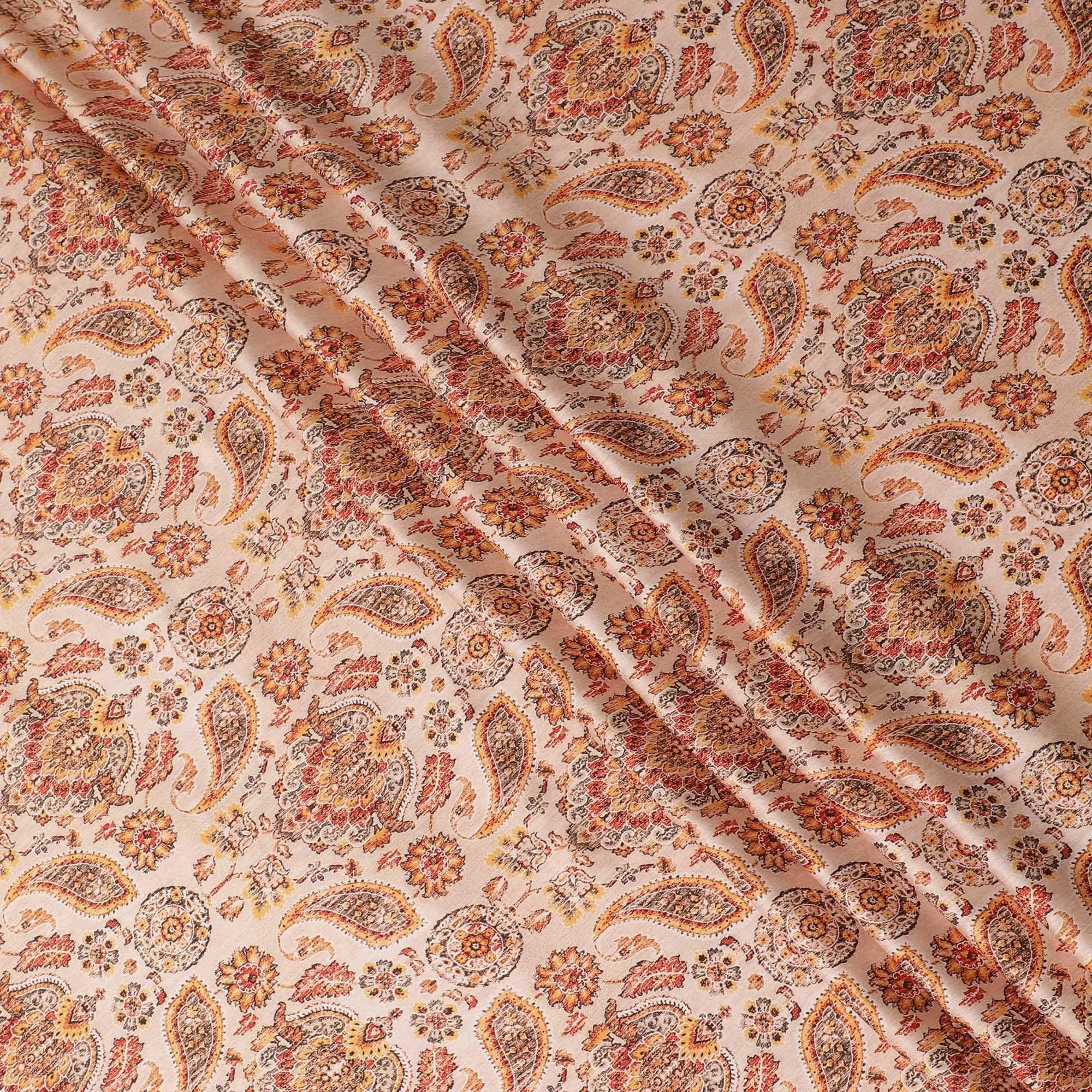 Peach synthetic satin fabric with multicolor print in paisley design-D14175